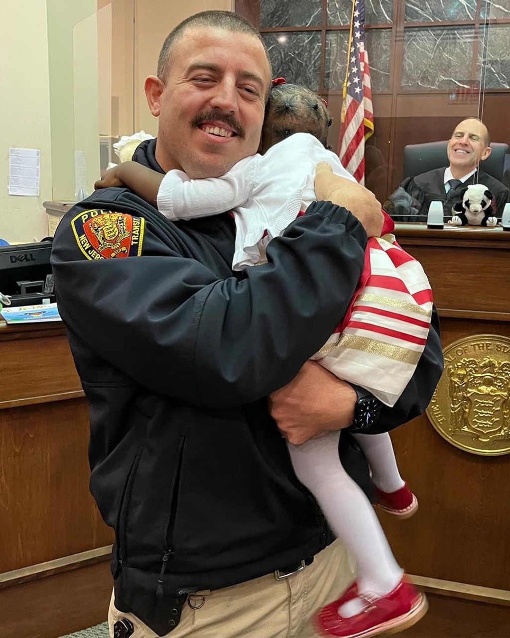 Police Officer Who Saved Baby Attends Adoption&nbsp;Ceremony