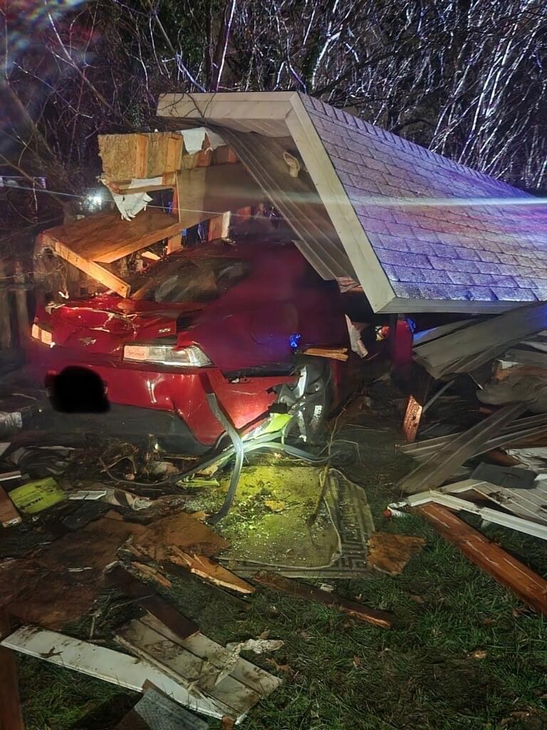 Driver Flees Car After Hitting Pole, Fence and Landing in&nbsp;Shed